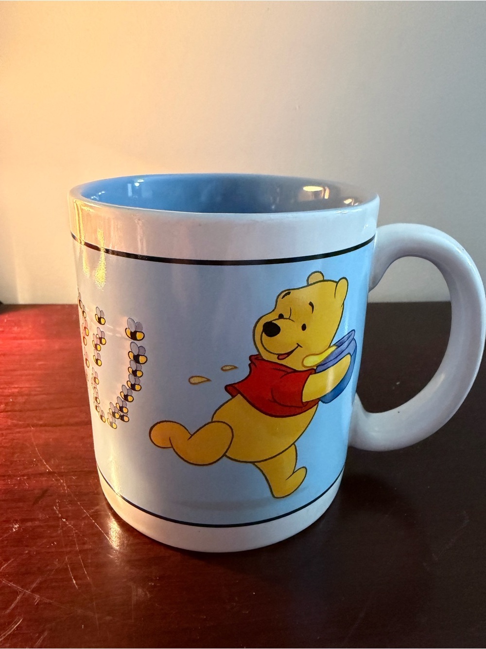 Disney Winnie the Pooh Blue and Yellow Ceramic Mug with Red Shirt Accent
